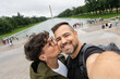 © Alvaro Lavin/Stocksy - Tourists taking selfie kissing in Washington D.C.