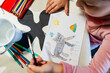 © Gemma can fly/Stocksy - Child drawing a cat