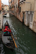 © Lupe Rodriguez/Stocksy - empty gondola parked on a canal in venice in italy