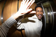 © Jimena Roquero/Stocksy - High five in elevator. Fisheye.