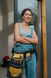 © Alina Hvostikova/Stocksy - Builder in overalls ready for construction repairs