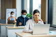 © Kawee - Asian attractive business people wear face mask and working in office.