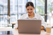 © David - Asian Business woman doing on laptop math finance on an office desk, tax, report, accounting, statistics, and analytical research concept