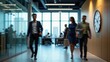 © BlackCat - A modern office environment with employees walking in a blurred motion effect. The office features stylish glass partitions, wooden panels, and a large clock on the wall. The movement captures the ene