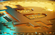 © Bernt Moss/Stocksy - Golden Bitcoin close up