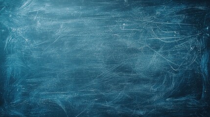 Wall Mural - textured blue chalkboard background for education and creativity