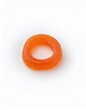 © art - A single, orange, ring-shaped gummy candy sits on a white background. The candy's translucent texture and vibrant color are highlighted against the clean backdrop.
