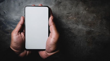 Wall Mural - smart device in hand: a pair of hands holds a modern smart device, showcasing its sleek design and i