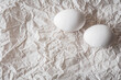 © Anna - White eggs placed on crumpled paper, creating a minimalist and organic composition. Soft natural light enhances textures, making it ideal for Easter, food photography, and rustic backgrounds