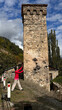 © Alina Hvostikova/Stocksy - Exploring traditional Svan tower in Svaneti, Georgia during autumn