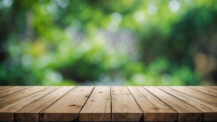 Leinwandbilder - Wooden tabletop in foreground with a soft green and blurred natural background creating a tranquil, inviting atmosphere for product displays.
