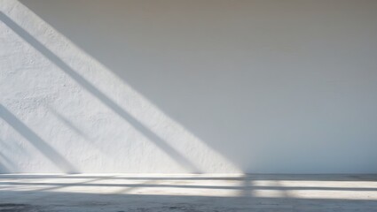 Aufkleber - Soft gray shadows cast diagonally across a clean white wall backdrop with a smooth floor beneath, creating a minimalistic and serene atmosphere.