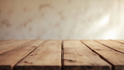 Fototapete - Wooden table with warm brown tones in the foreground, set against a soft, blurred neutral background creating a minimalist aesthetic.