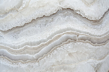 Aufkleber - Close up of stone surface emphasizing texture and layers of natural mineral formation, showcasing intricate patterns and subtle color variations