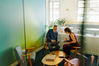 © BONNINSTUDIO/Stocksy - Business people working together in modern office room