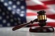 © miss irine - Judge gavel on table. Judicial hammer for attention, verdict. Justice judgment at courts of law. American flag waves in background. Legal, criminal authority, law system and state punishment.