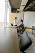 © 4Max - office workers working together