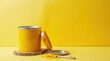 © Caspernik - Cheerful yellow paint can display against matching background