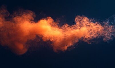 Wall Mural - an orange smoke on a black background.