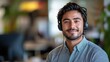 © Jersco - Close-up portrait of a professional IT support technician, wearing a headset, office environment background