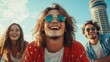 © JoxyAimages - A group of cheerful friends sharing laughter outdoors creates a joyful and memorable moment, radiating positive energy against a bright blue sky as they enjoy life's adventures.