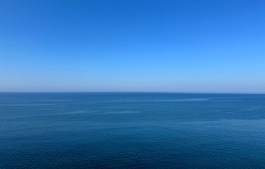 Wall Mural - endless sea and blue sky to the distant horizon.