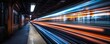 © sungedi - A long exposure photograph of a moving train in a subway station