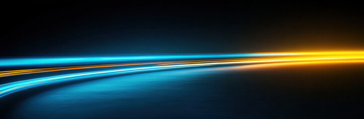 Wall Mural - vibrant display of blue and orange light trails on dark background creates dynamic and energetic atm