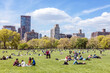 © Matteo Colombo - Lawn in Central Park in springtime with people, New York city, USA