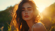© wikanda - Golden hour shot of a woman with sunlit hair and natural makeup in nature