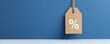 © stang - A brown price tag with a percentage symbol hangs against a blue wall, suggesting discounts or sales.