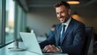 © Shams - Focused Entrepreneur: A sharp, stylish businessman, in a tailored suit, exudes confidence and contentment as he works diligently on his laptop within a contemporary office space.