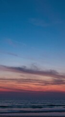Wall Mural - sky transform from the first light of dawn to a radiant sunrise, with beautiful clouds painting the 