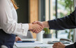 © Celt Studio - Close-up handshake between business professionals in office, successful agreement, job interview, partnership deal, career opportunity, teamwork, negotiation, contract signing, hiring process