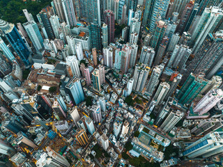 Poster - Aerial panorama showcases Hong Kong city's dense urban sprawl. Tall buildings dominate the landscape in this bird's-eye view.