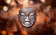 © Ruten - Una obra de arte tribal muy detallada con patrones geométricos y símbolos culturales inspirados en el arte africano e indígena americano