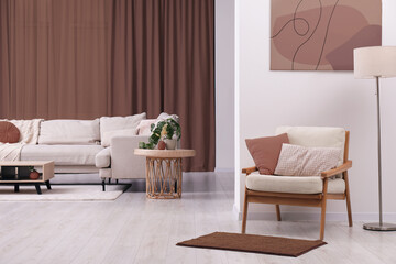 Poster - stylish apartment with elements in mocha mousse shade. interior design with trendy color of 2025 yea