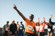 © Jacob Lund - Triumphant moment for a diverse running club after a race