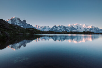 Fototapete - Mighty Mont Blanc massif is reflected in the calm waters of Lac Blanc. Location place Chamonix resort, Graian Alps, France, Europe.