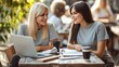 © Road Red Runner - Friends enjoying a productive study session at a cozy outdoor cafe with copy space for text