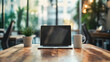 © Muaz - Laptop and Mug on Wooden Table in Modern Office