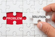 © Mobasser - Hands Connecting Problem and Solution Puzzle Pieces, Concept of Business Problem Solving, Success and Collaboration in Business Strategy