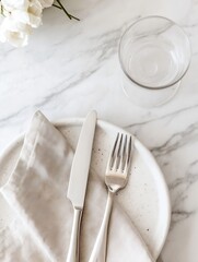 Leinwandbilder - Elegant table setting featuring a simple plate cutlery and a stylish glass on marble surface : Generative AI
