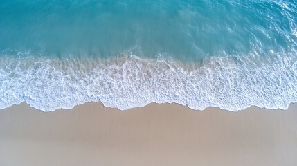 Poster - Aerial view of waves lapping gently on a sandy beach under bright sunlight in a tropical setting : Generative AI