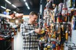 © Serhii - Portrait of mature man standing in hardware store