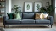 © VRVisionary - Living area featuring a grey sofa, decorative pillows, and a bookshelf.