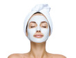 © Vivid_Vision - Woman applying white facial mask for skincare treatment