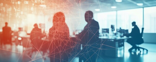 Blurred silhouettes of people working in a modern office setting