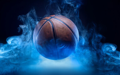 Wall Mural - Basketball ball in blue smoke on a black background. Copy space.