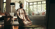 © peopleimages.com - Muslim, worship and salah with man at home for ramadan kareem, spiritual or religion. Floor, faith and eid Mubarak with Islamic person and pray in living room for gratitude, Allah or tahiyat pointing